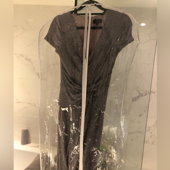 wedding dresses . Laura size 6. but is very stretchy. i’m wearing 8 . it’s good - Picture 4 of 6